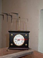 A flying ball clock