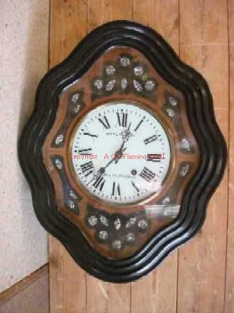 Front view of Tableau Comtoise clock