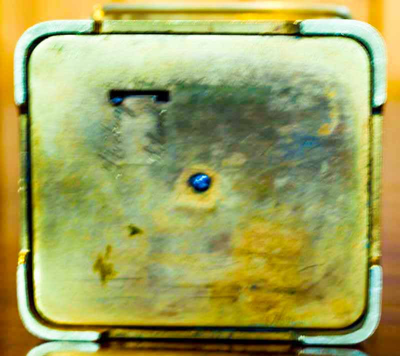 bottom of Petite Sonnerie carriage clock showing strike/silent lever