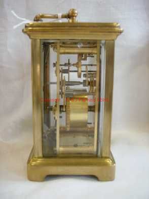 Left side view of carriage clock with cylinder platform