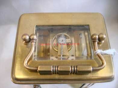 Top view of carriage clock with cylinder platform