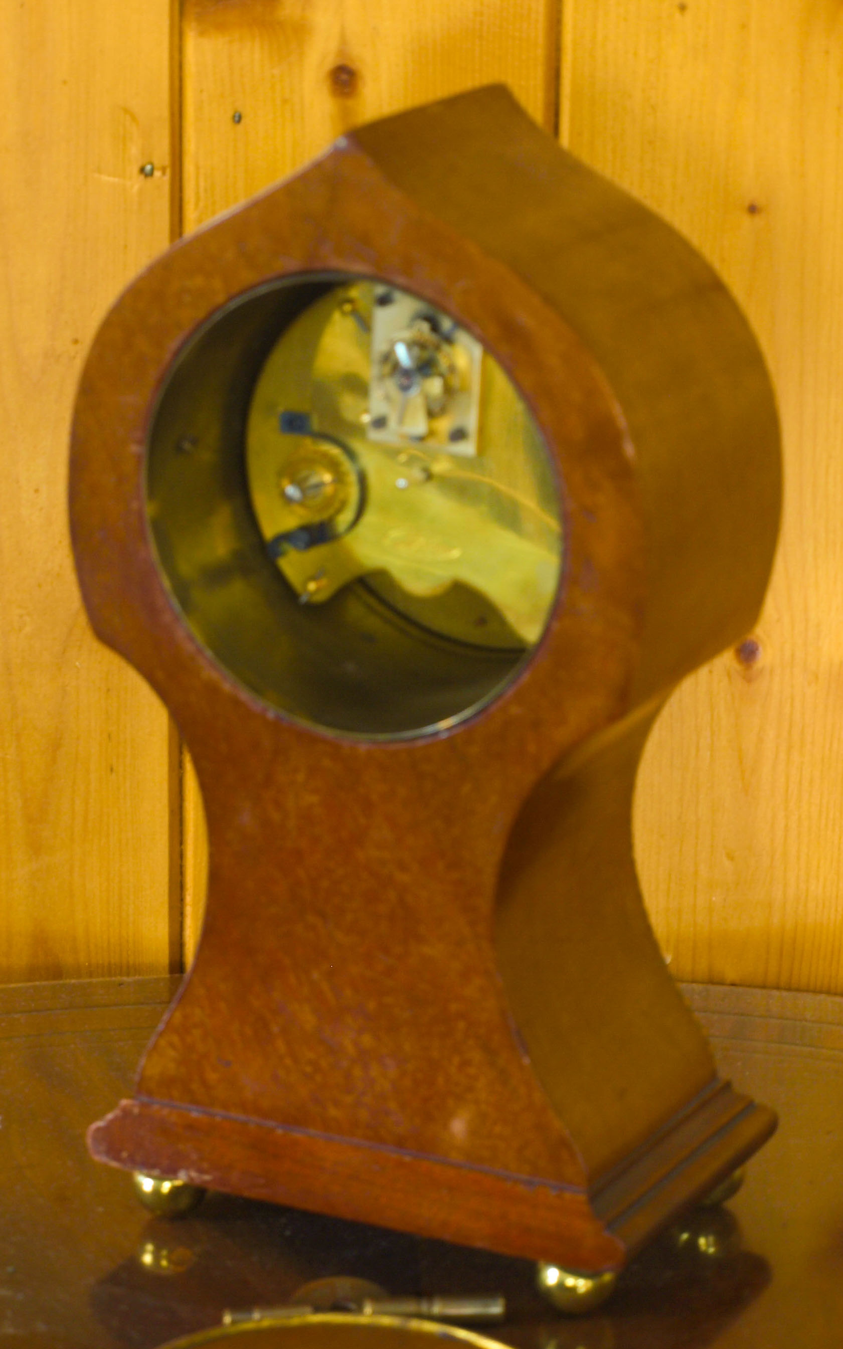 Rear and left side view of mantel clock with  R & Co French movement