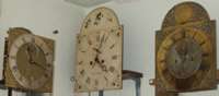3 Clocks on the wall of the workshop